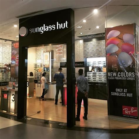 sunglass hut owned by luxottica